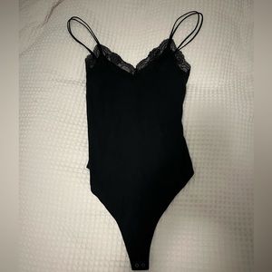 Black Abercrombie bodysuit with lace v-neck